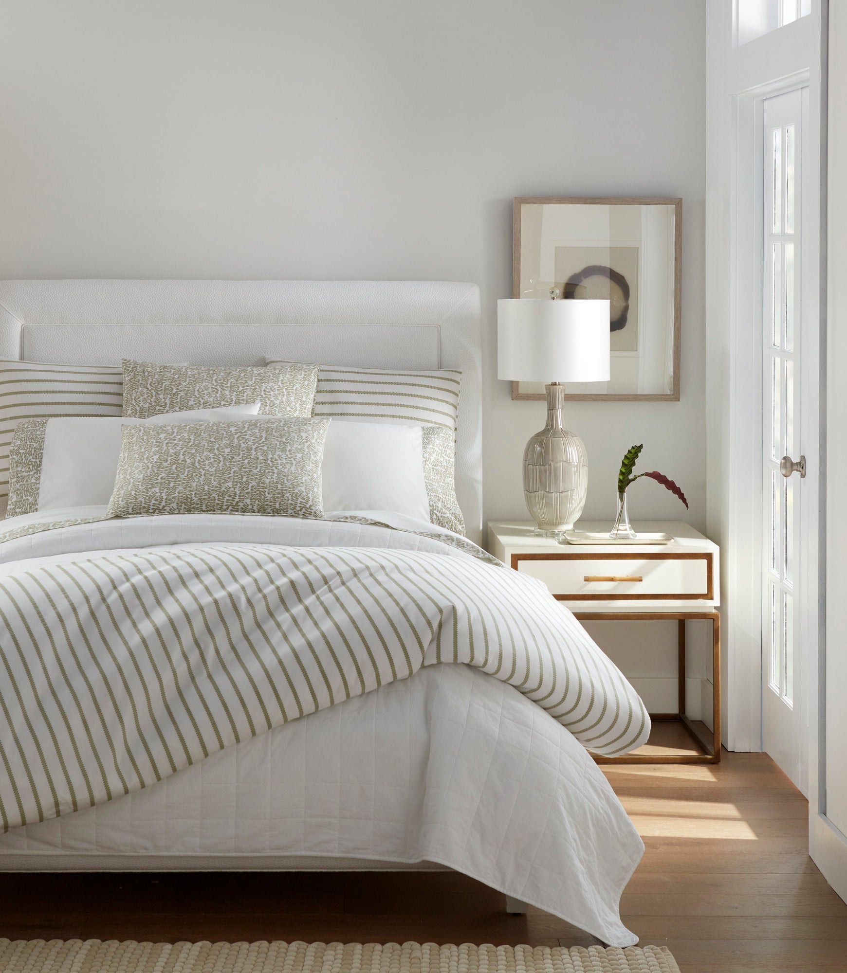 ribbon stripe percale Olive duvet cover on a bed in bedroom