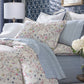 Emma Printed Sateen Pillowcase Blue on Bed