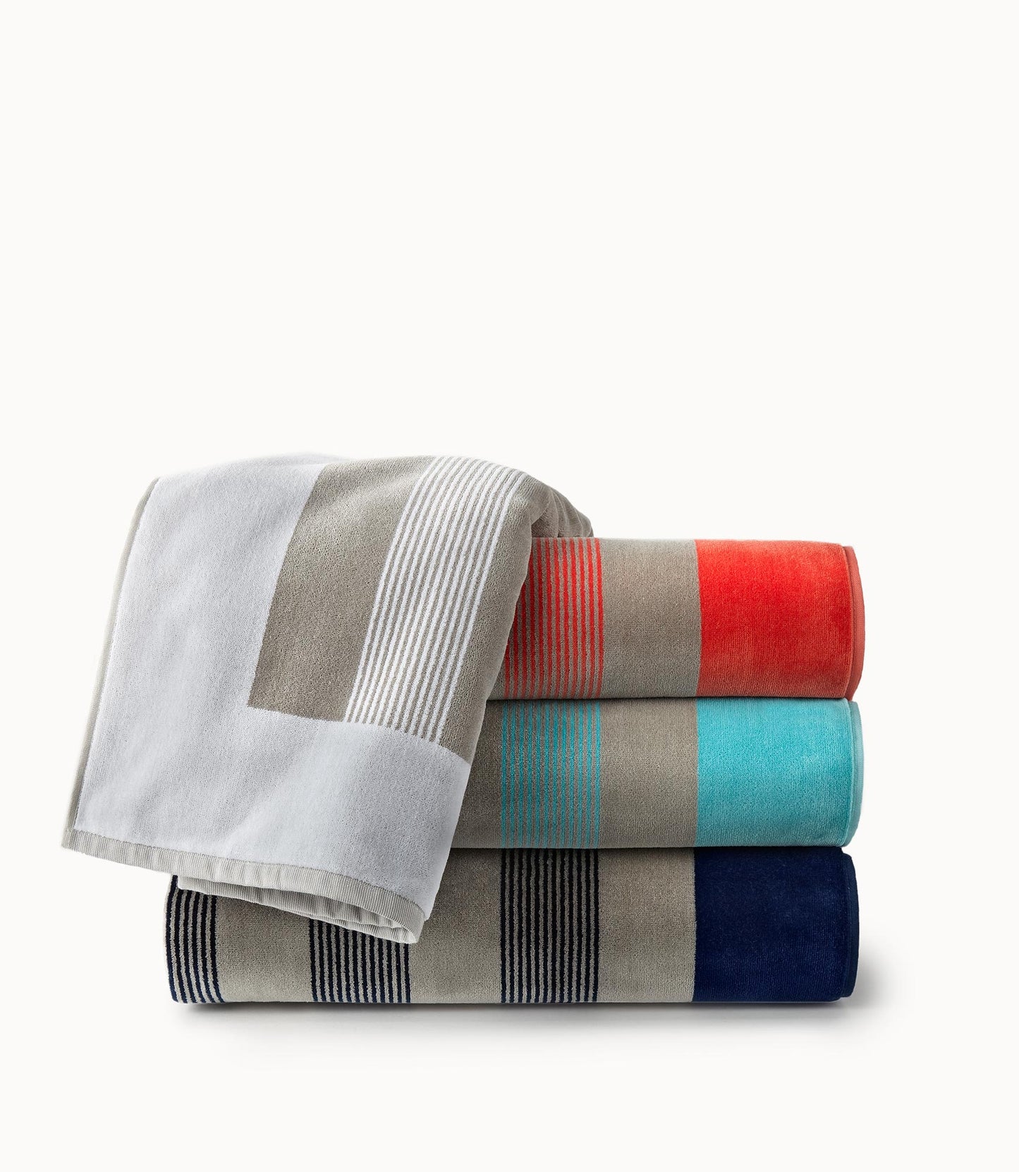 Soleil Stripe Beach Towel Folded On Stack