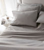 Soprano Sateen Flat Sheet in Pewter on Bed