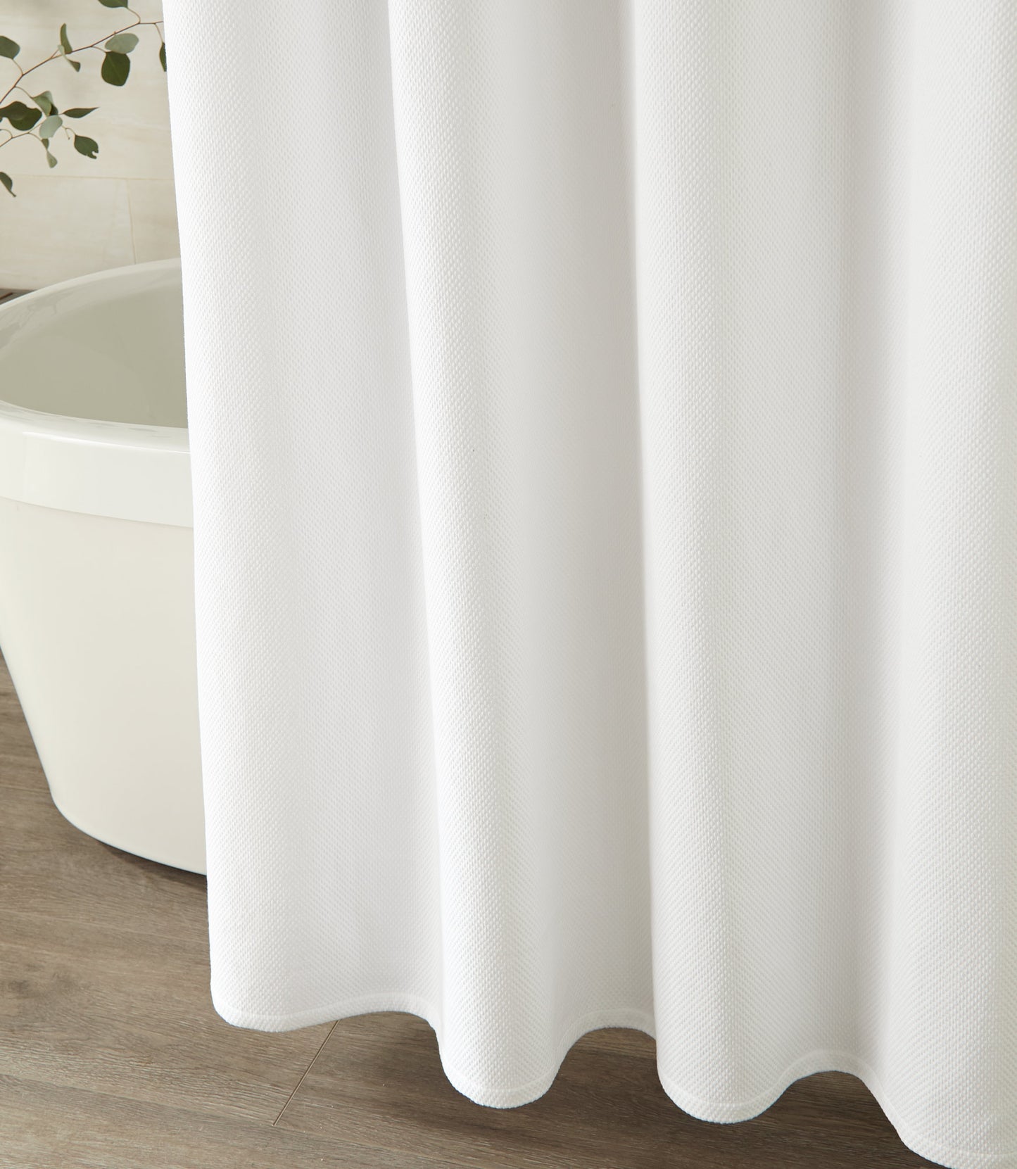 Spa Shower Curtain Hanging In Front Of Tub