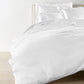 Virtuoso White Duvet Cover on Bed